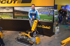 John Ledwidge, grounds manager, Leicester (England) City Football Club, poses with one of the Infinicut walk-behind mowers he uses on his pitch back home. The technology was recently acquired by Cub Cadet.