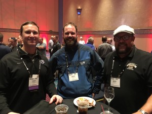 Kevin White, athletic field manager, University of Portland (Ore.), Jeremy Nelson, City of Portland (Ore.), and Barry Jameson, lead grounds maintenance at Taft (California) Union High School, enjoy some food, drinks and great conversation at the Welcome Event sponsored by Toro and Covermaster.