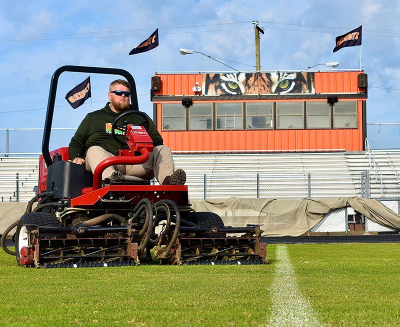 Andrew Miller says he can’t live without his John Deere 2653B PrecisionCut Triplex mower. (Photo: John Miller)