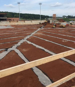 More than 7,000 tons of dirt were barged down the Mississippi River to the Tennessee River and then trucked to Madison, Ala. (Photo: Hoar Construction)