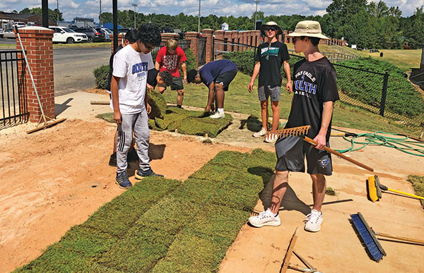South Forsyth High School turfgrass students install sod. (Photo: Russ Bayer)