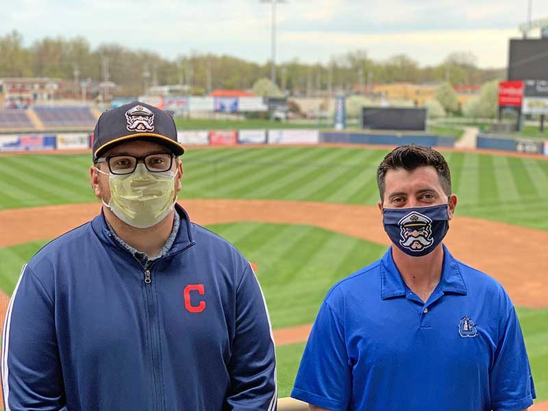 Drew Maskey, director of turf management, and Matt Hill, assistant groundskeeper, work to get Classic Park ready for the Lake County Captains' opening day, which is less than a month away. (Photo: ATN Staff)