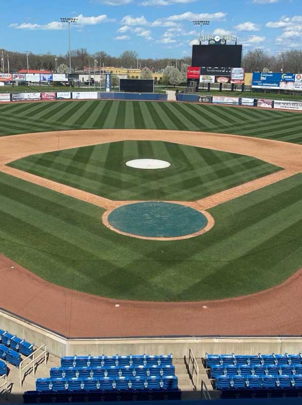 Drew Maskey, director of turf management, says he makes it a point to end the day with assistant groundskeeper Matt Hill by looking at the field from the main entrance gate. He says it's important to get a feel for what the fans see. (Photo: Drew Maskey)