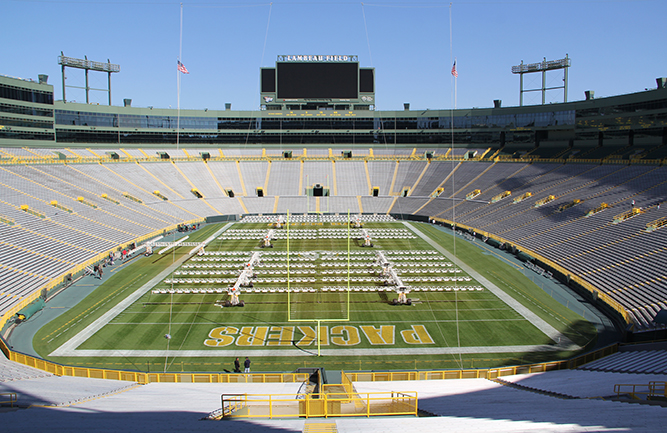 New York Jets quarterback Aaron Rodgers spent his first 18 seasons in the NFL playing home games on natural grass at the Green Bay Packer’s Lambeau Field, pictured here. Only four snaps into his first season with the New York Jets, Rodgers suffered an Achilles tear. Some are blaming the artificial turf at MetLife Stadium. (Photo by: Athletic Turf staff)
